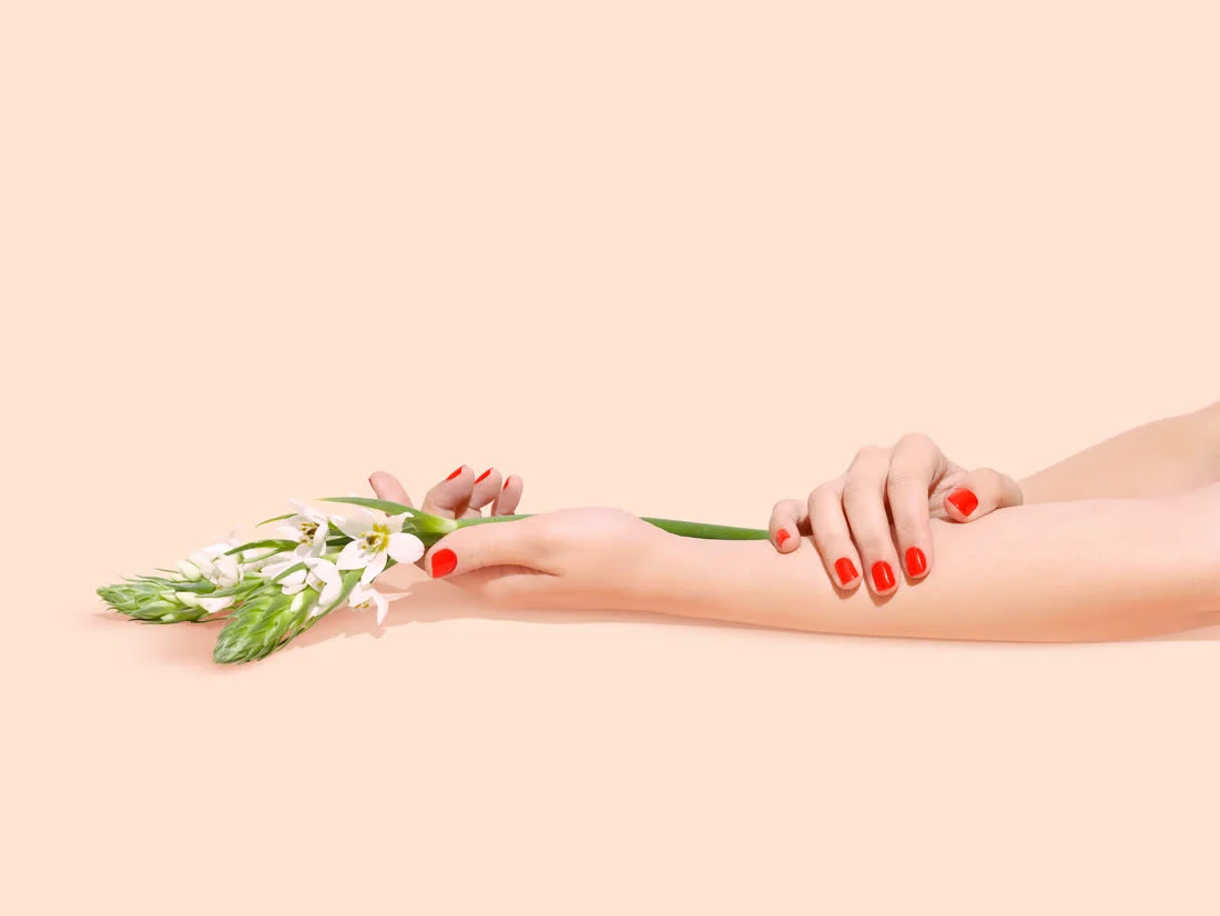 SNS — red dipping-powder nails with white flowers